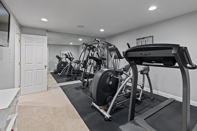 exercise room featuring carpet flooring