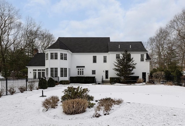 view of snow covered property