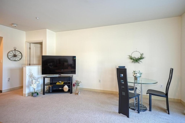 dining space with carpet floors