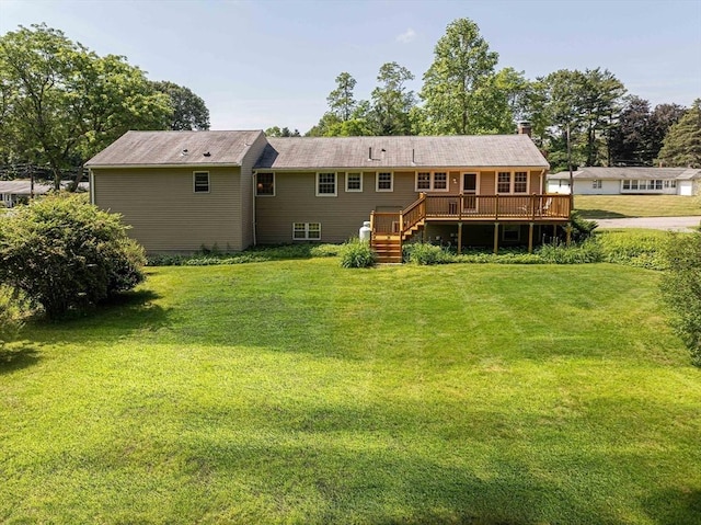32 Eaton Rd W, Framingham, MA 01701 - rear view of property with a deck, stairs, and a yard