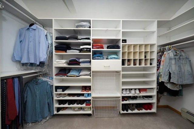 32 Eaton Rd W, Framingham, MA 01701 - walk in closet with a baseboard radiator and carpet flooring