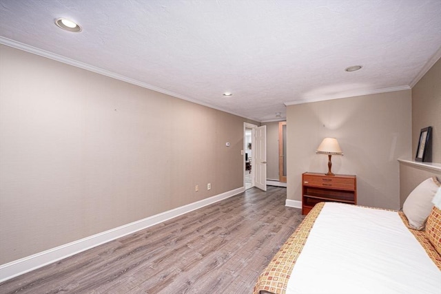 32 Eaton Rd W, Framingham, MA 01701 - bedroom featuring wood finished floors, recessed lighting, and ornamental molding