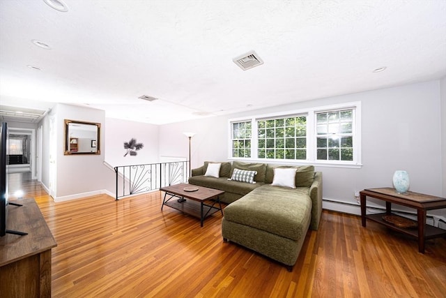 32 Eaton Rd W, Framingham, MA 01701 - living area with wood finished floors