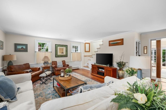 5 Putnam Ave, Barnstable, MA 02635 - living room with crown molding, stairway, wood finished floors, and baseboard heating