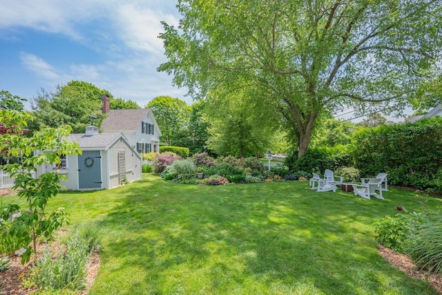 5 Putnam Ave, Barnstable, MA 02635 - view of green lawn featuring a shed