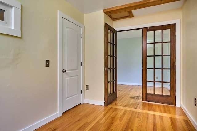 18 Coombs Hill Rd, Colrain, MA 01340 - corridor with french doors, light wood-type flooring, and baseboards