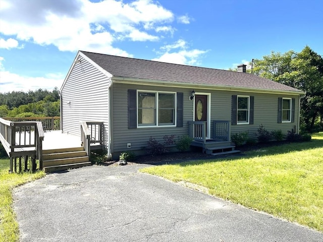 18 Coombs Hill Rd, Colrain, MA 01340 - view of front of home featuring a front yard and a wooden deck