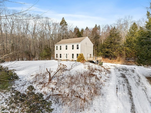 view of front of home featuring a wooden deck