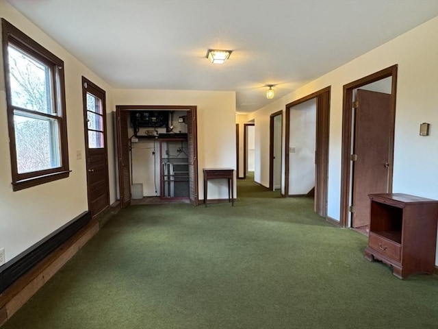 unfurnished room featuring carpet