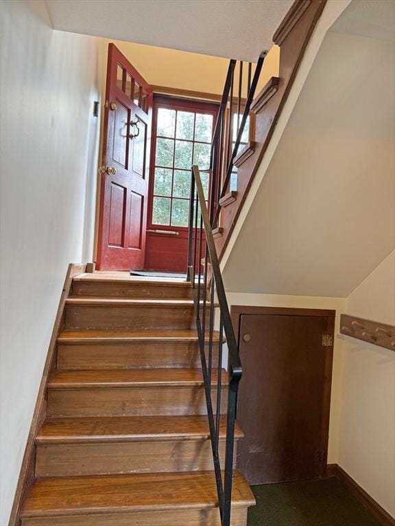 stairway with baseboards