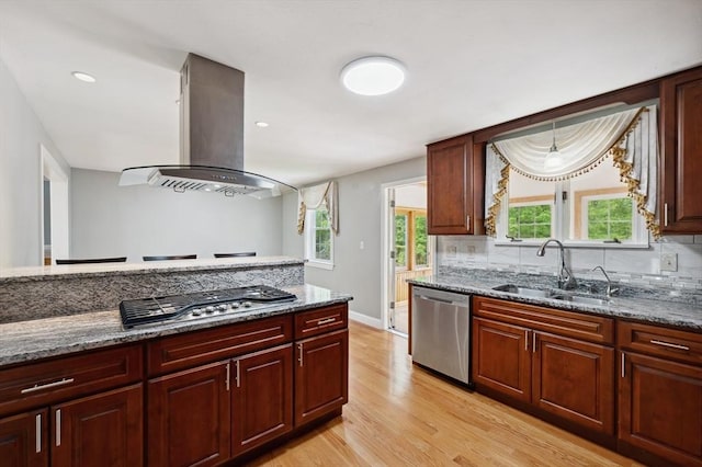 451 Lincoln St, Abington, MA 02351 - kitchen with appliances with stainless steel finishes, island range hood, light wood-style flooring, a sink, and plenty of natural light