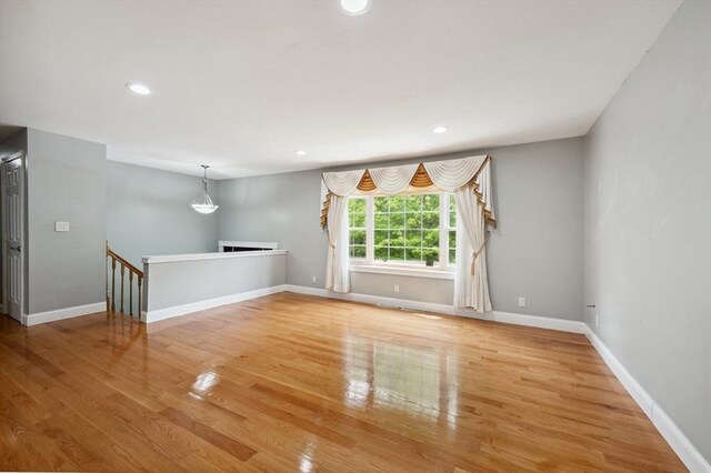 451 Lincoln St, Abington, MA 02351 - empty room with wood finished floors, recessed lighting, and baseboards