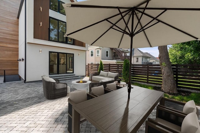 33 Conwell Ave, Somerville, MA 02144 - view of patio / terrace featuring a fire pit, french doors, and outdoor dining area