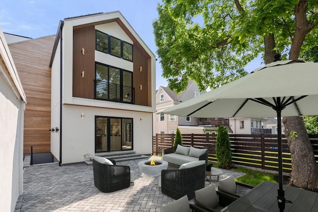 33 Conwell Ave, Somerville, MA 02144 - view of patio with french doors, an outdoor living space, and outdoor dining space