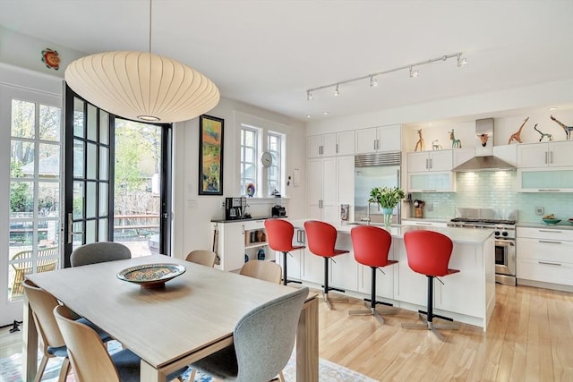 dining room featuring light wood-style flooring