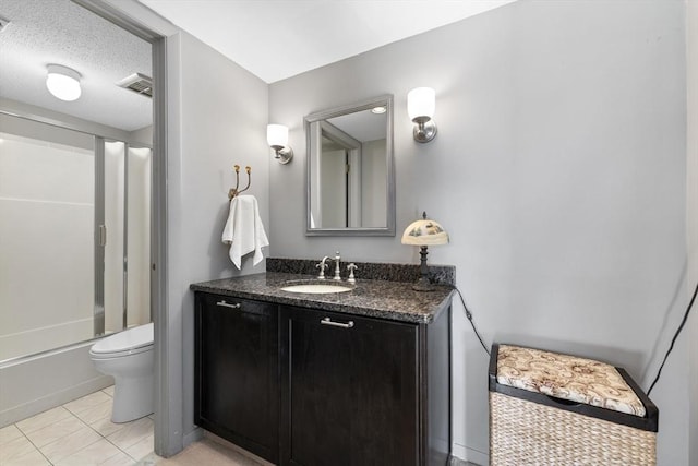 full bath featuring shower / bath combination, visible vents, toilet, a textured ceiling, and vanity