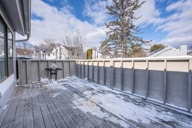 view of snow covered deck