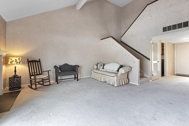 sitting room featuring high vaulted ceiling, stairway, carpet flooring, and visible vents