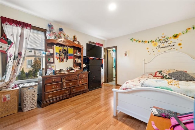 bedroom featuring light hardwood / wood-style floors