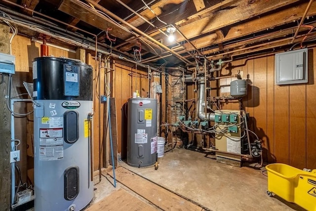 utility room featuring water heater and hybrid water heater