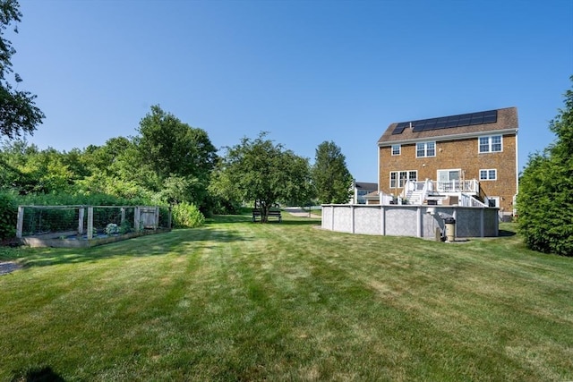 758 Council Oak Way, Dighton, MA 02715 - view of grassy yard featuring a garden, stairway, and a deck