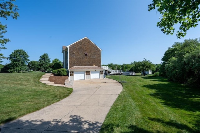 758 Council Oak Way, Dighton, MA 02715 - view of side of property with a garage, a lawn, driveway, and brick siding