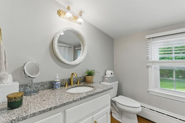 905 Stony Hill Rd, Wilbraham, MA 01095 - bathroom with a baseboard radiator, plenty of natural light, vanity, and toilet