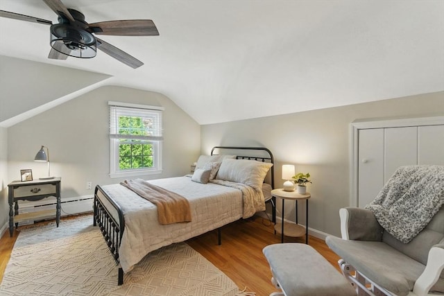 905 Stony Hill Rd, Wilbraham, MA 01095 - bedroom featuring light wood finished floors, lofted ceiling, baseboards, ceiling fan, and a baseboard radiator