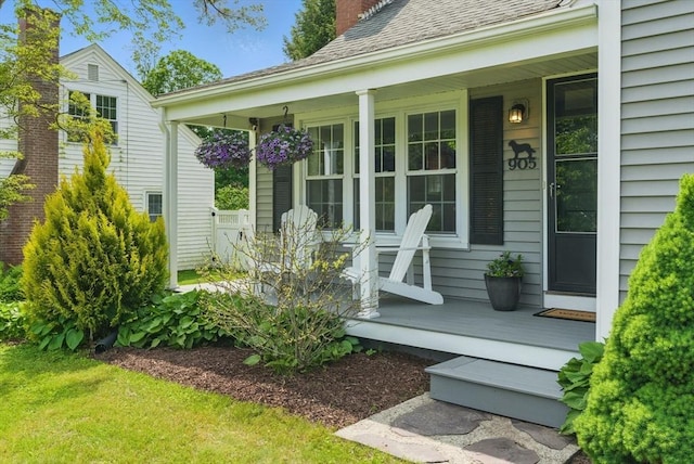 905 Stony Hill Rd, Wilbraham, MA 01095 - doorway to property with covered porch, a chimney, and a shingled roof