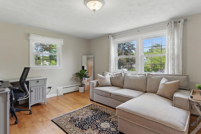 905 Stony Hill Rd, Wilbraham, MA 01095 - office space featuring a baseboard heating unit, light wood-style floors, and baseboards