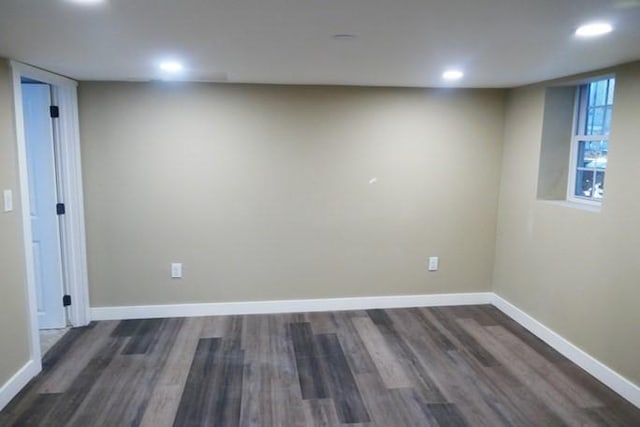 basement with dark wood-style floors, recessed lighting, and baseboards