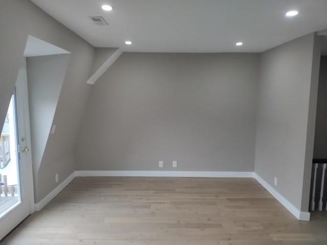 bonus room with visible vents, baseboards, light wood-style flooring, and recessed lighting