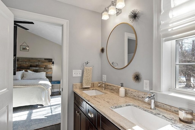 bathroom featuring double vanity and a sink