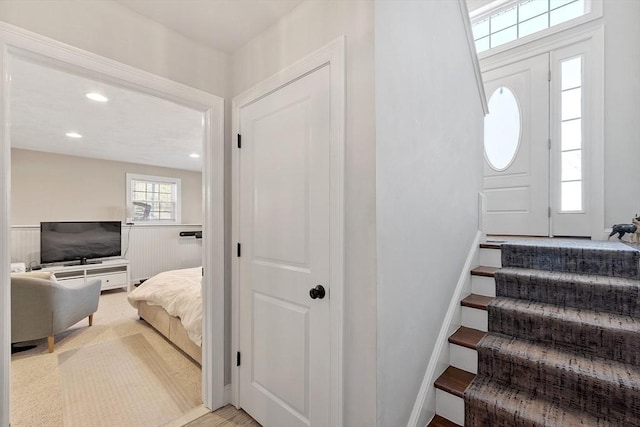 interior space featuring carpet flooring and recessed lighting