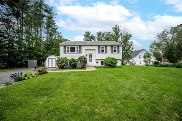 61 Wright Rd, Ayer, MA 01432 - raised ranch featuring driveway, a storage unit, and a front yard