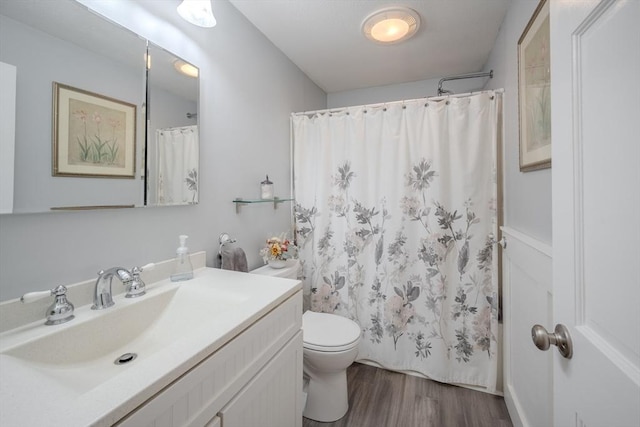 61 Wright Rd, Ayer, MA 01432 - bathroom featuring vanity, wood finished floors, and a shower with shower curtain