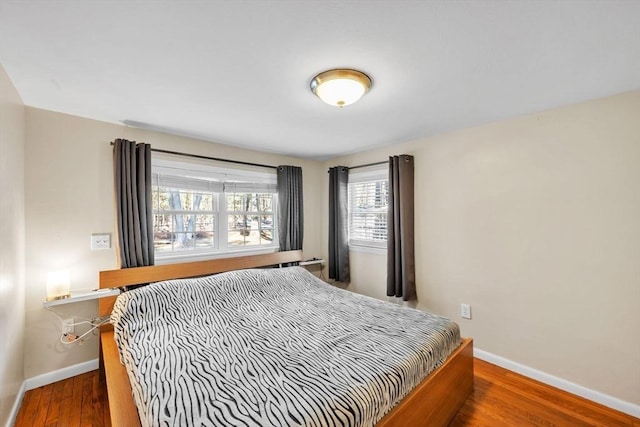 bedroom featuring dark hardwood / wood-style floors