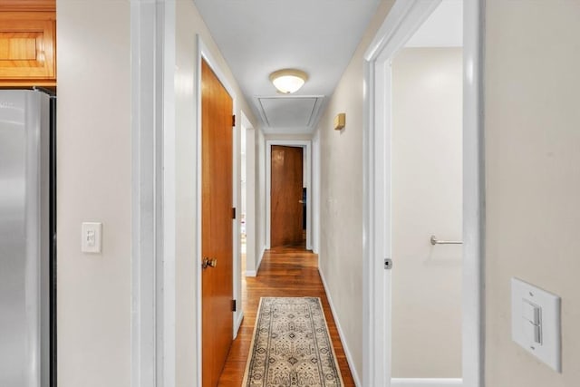 hallway with wood-type flooring