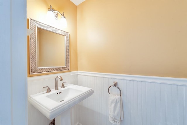 1051 Elm St Unit 8, West Springfield, MA 01089 - bathroom with wainscoting and a sink