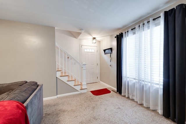 1051 Elm St Unit 8, West Springfield, MA 01089 - carpeted entrance foyer with stairway and baseboards