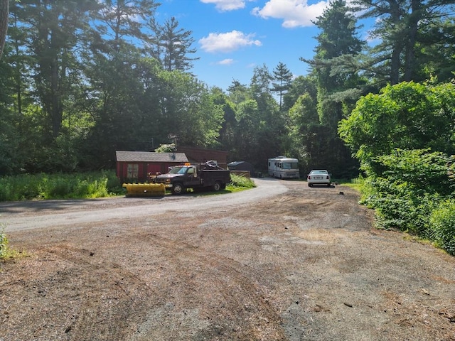 2 Tenney Ct, Georgetown, MA 01833 - view of dirt / gravel road featuring a view of trees
