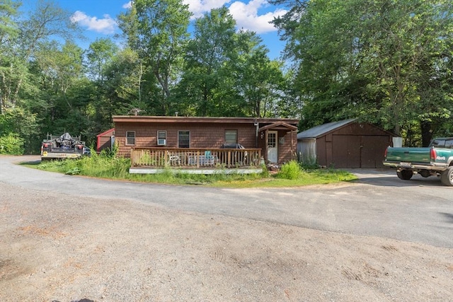 2 Tenney Ct, Georgetown, MA 01833 - view of front of property with a shed and a wooden deck