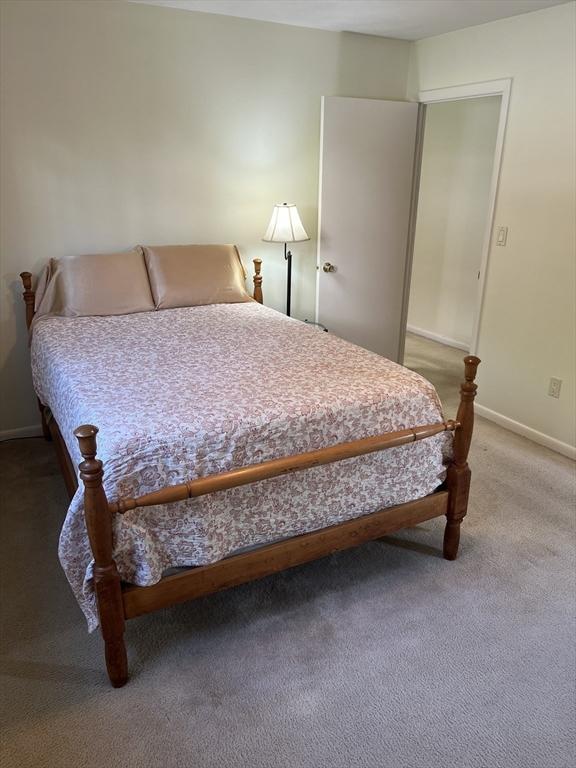 20 Colonial Dr Unit 3, Andover, MA 01810 - carpeted bedroom featuring baseboards