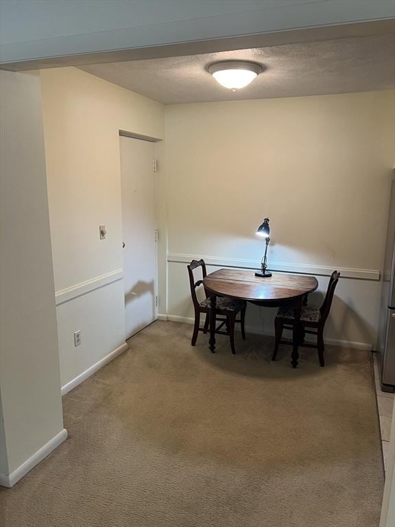 20 Colonial Dr Unit 3, Andover, MA 01810 - dining space with light colored carpet and baseboards