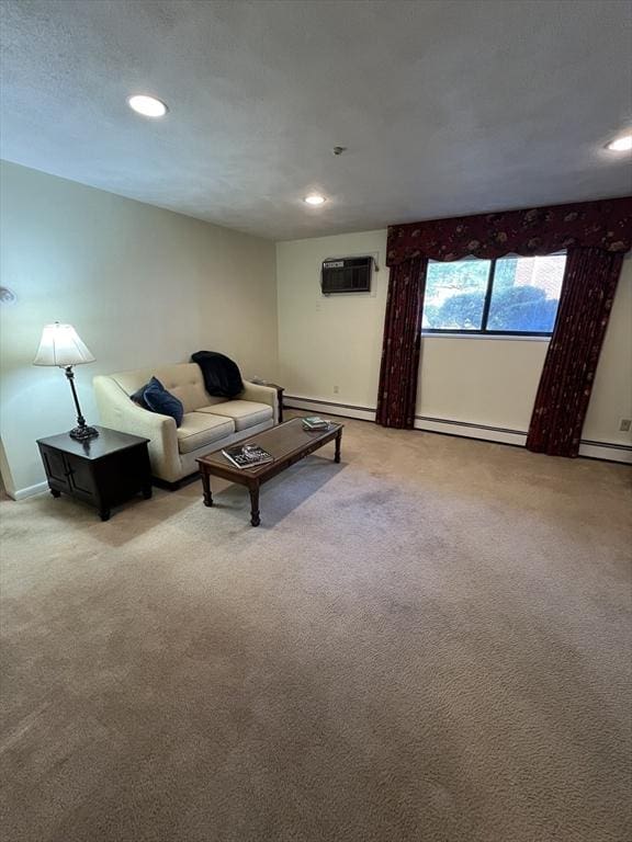 20 Colonial Dr Unit 3, Andover, MA 01810 - living area with light colored carpet, an AC wall unit, recessed lighting, a baseboard radiator, and baseboards