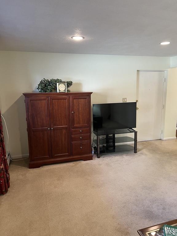 20 Colonial Dr Unit 3, Andover, MA 01810 - sitting room with light colored carpet, recessed lighting, and baseboards
