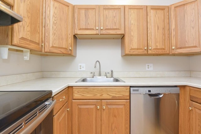 154 E Bacon St Unit B6, Plainville, MA 02762 - kitchen with appliances with stainless steel finishes, a sink, under cabinet range hood, and light countertops