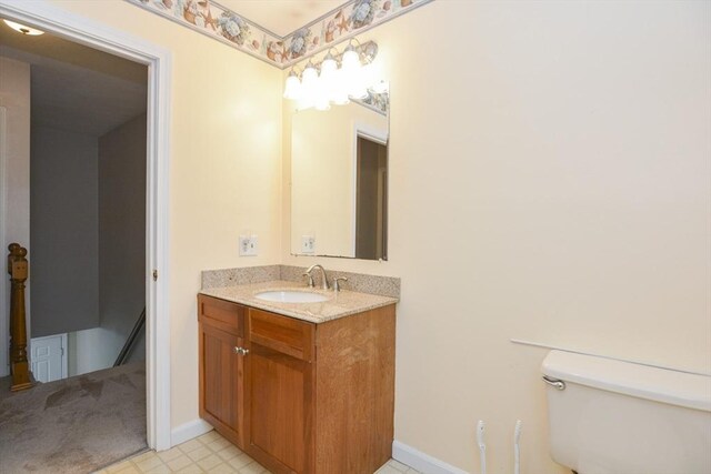 154 E Bacon St Unit B6, Plainville, MA 02762 - bathroom with vanity, toilet, and baseboards