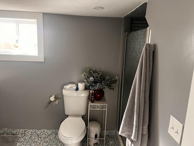 bathroom featuring toilet