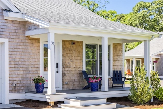 doorway to property featuring a porch